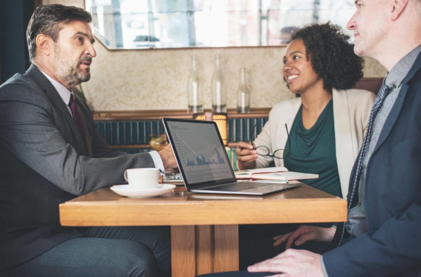 Modern financial classroom with engaged adult learners